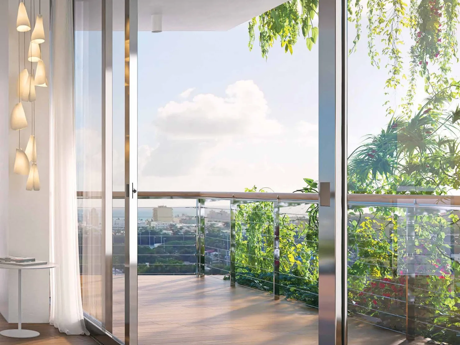 A residence terrace with hanging garden planting along the rail and full-height sliding glass onto the interior